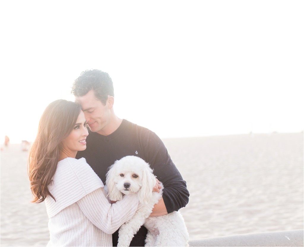 pretty couple in Hermosa Beach with their white dog