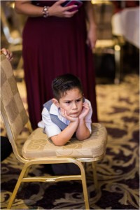 pouting little boy at wedding