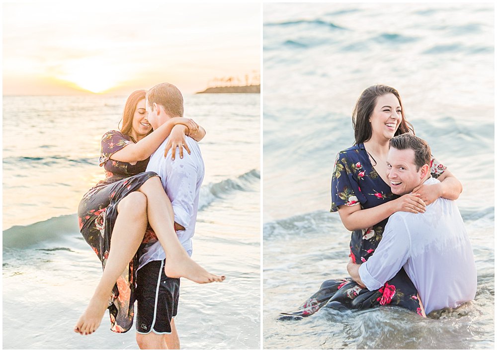 happy couple in the ocean during sunset engagement photos at Laguna Beach