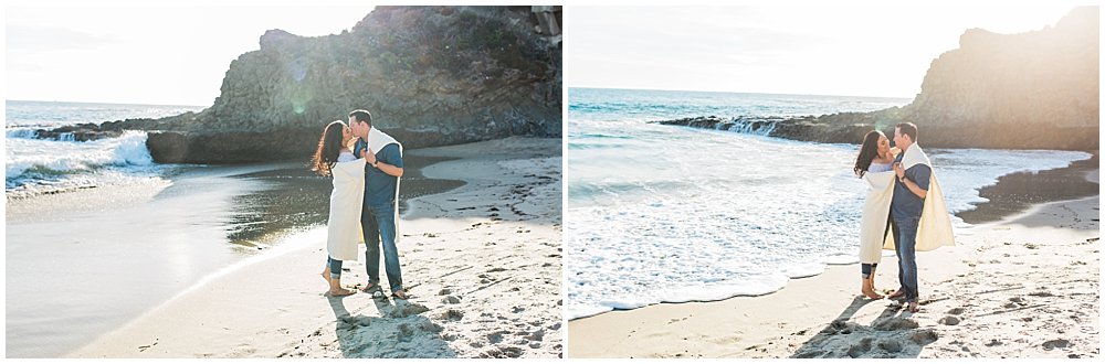 Couple getting cozy during Laguna Beach engagement session