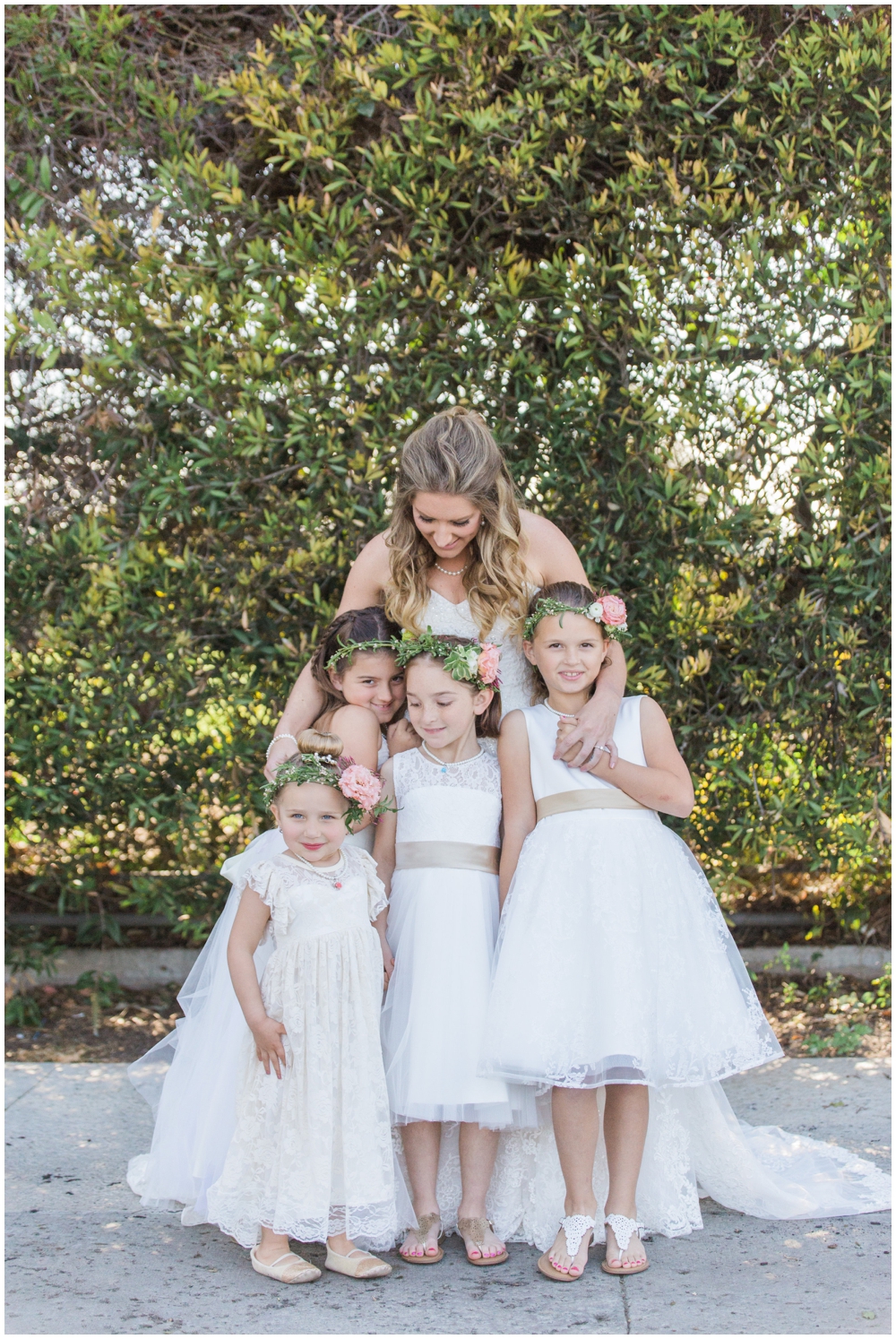 bride with flower girls wearing flower girls with succulents and pink roses