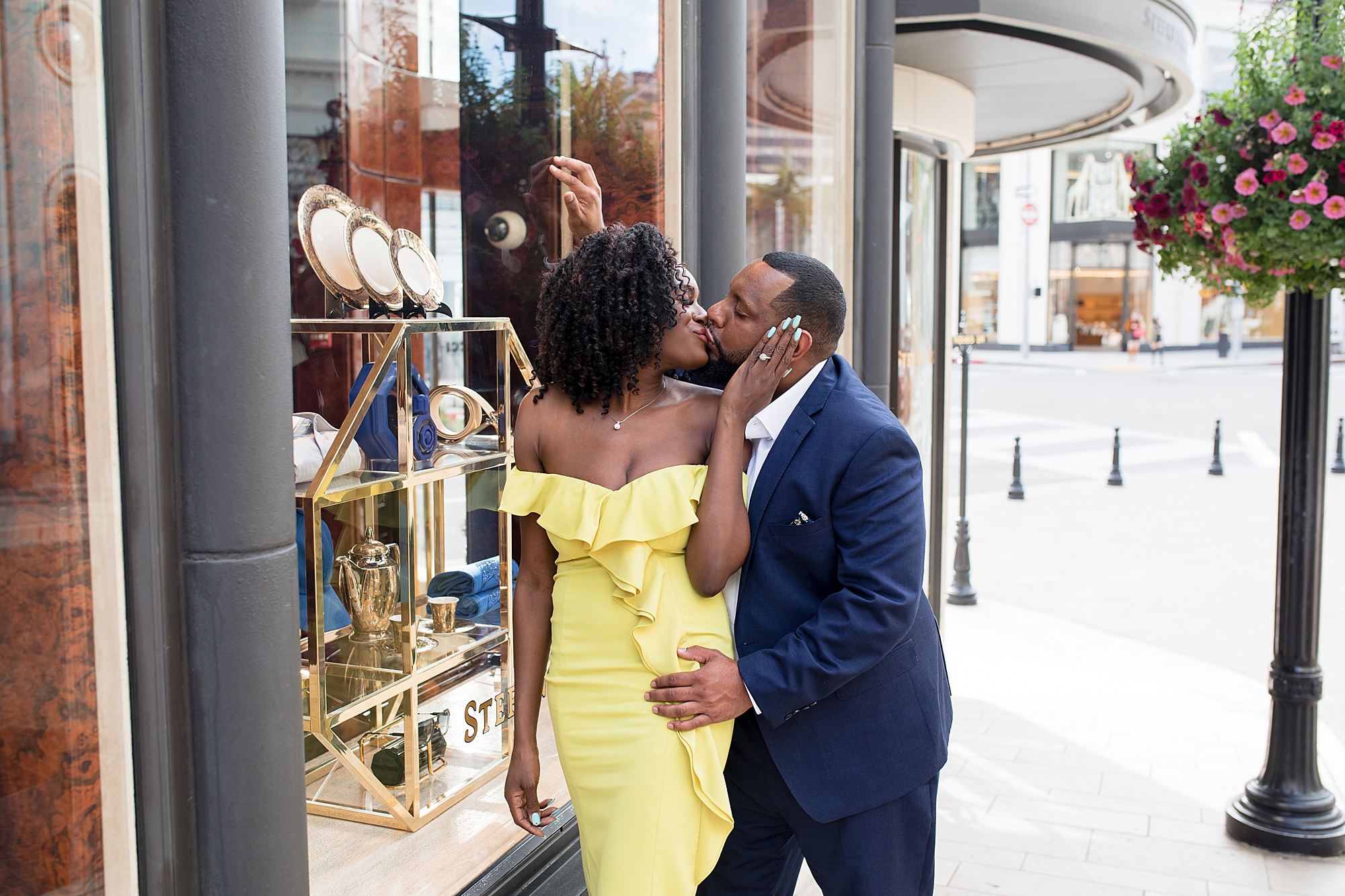couple kissing outside of a jewelry store on rodeo drive