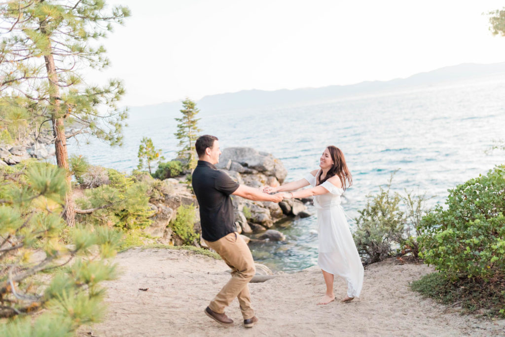 lake tahoe couple dancing in their engagement photos