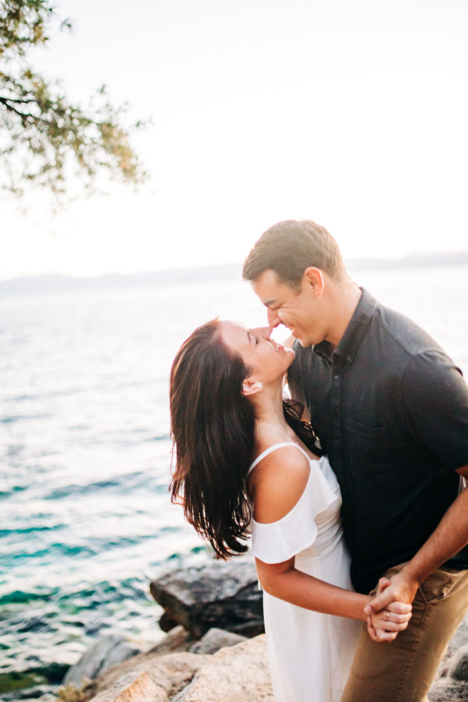 lake tahoe couple posing ideas almost kissing