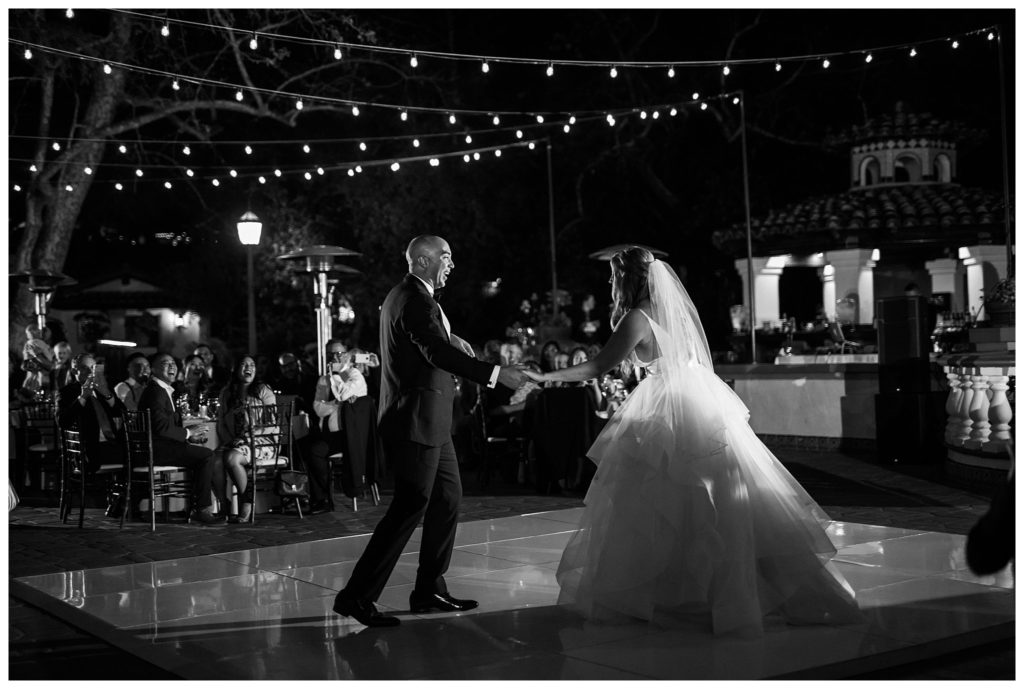 first dance under twinkle lights at wedding