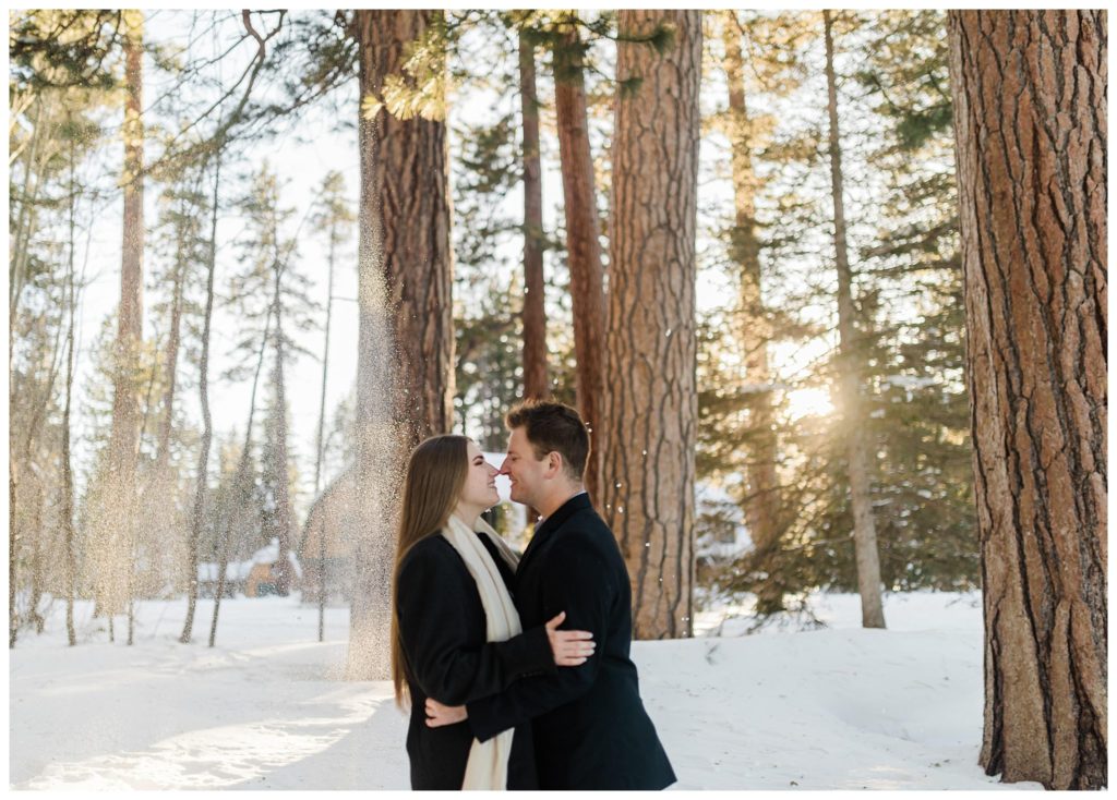 couple faving nose to nose in snow