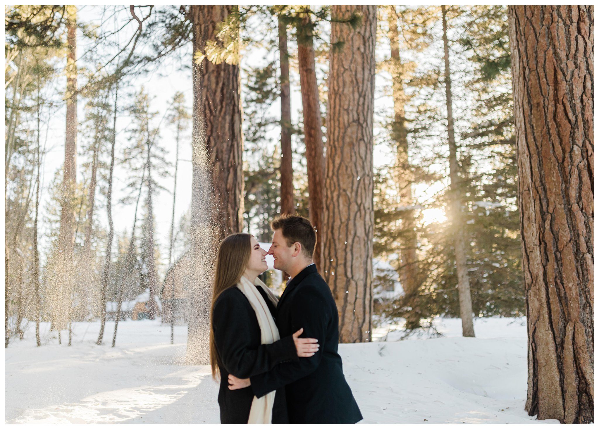 couple facing nose to nose in snow