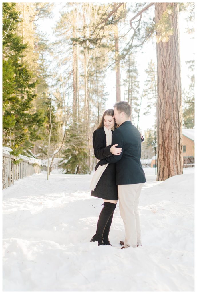 couple hugging pose for engagement photos