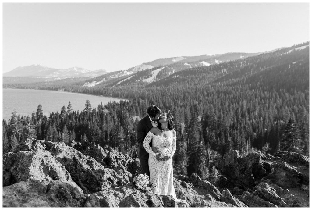 couple kissing on eagle rock in lake tahoe