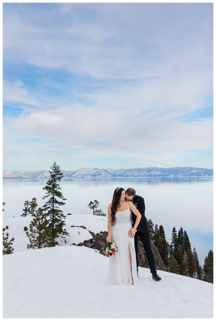 groom kissing the brides neck while posing for photos in lake tahoe