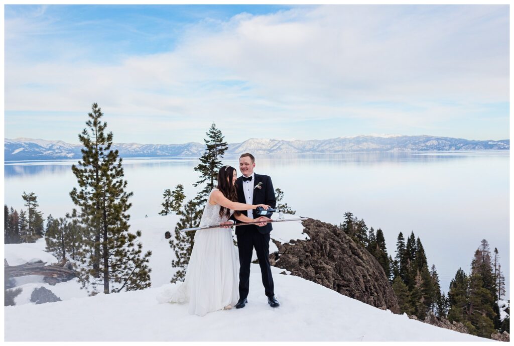 bride pouring champagne into shotski for wedding photos in snow at lake tahoe