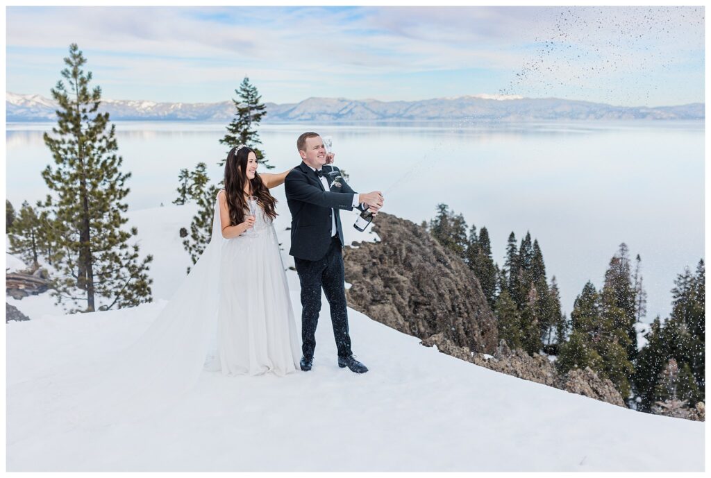 wedding couple popping champagne in the snow at lake tahoe
