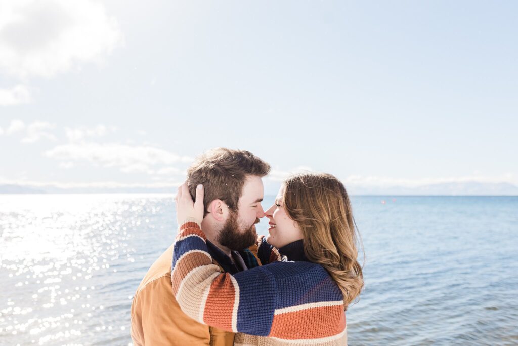 Lake Tahoe Snowy Beach Proposal Engagement Photography.